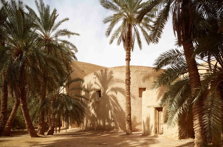 The entrance to Tamazid, the environmentalist Mounir Neamatalla’s home in Egypt’s Siwa Oasis, like the rest of the building, was constructed with kershef, a traditional building material made from mud and salt.