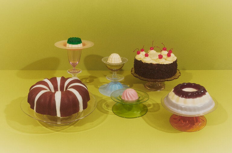 Retro desserts, including Bundt cake (far left), Black Forest cake (top right) and blancmanges, created for T by the London- and Cairo-based caterer and creator Marie Cassis.