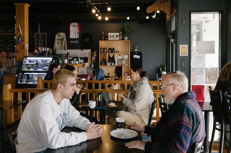 College sophomore Zach Ahmed, left, and retired salesman Richard Bement met through the Opening Minds through Art program, designed to foster intergenerational understanding.