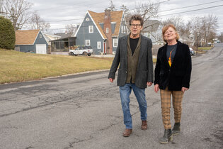 Chip Roberts and Debbi Calton-Roberts in Hudson, N.Y., where they recently bought a home. With a budget of $600,000, the couple wanted a house with a first-floor bedroom, a yard for a chicken coop and an easy walk to Hudson’s main drag.