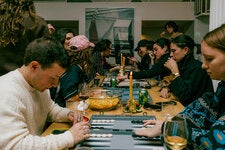 Games underway at the Valentine’s Day edition of the Lesbian and Bisexual Backgammon League, or L.B.B.L., held at Bortolami Gallery in New York’s TriBeCa neighborhood.
