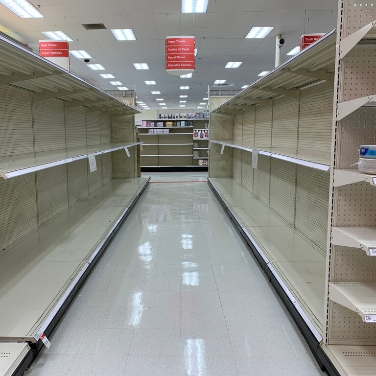 Completely empty shelves in an aisle at Target.