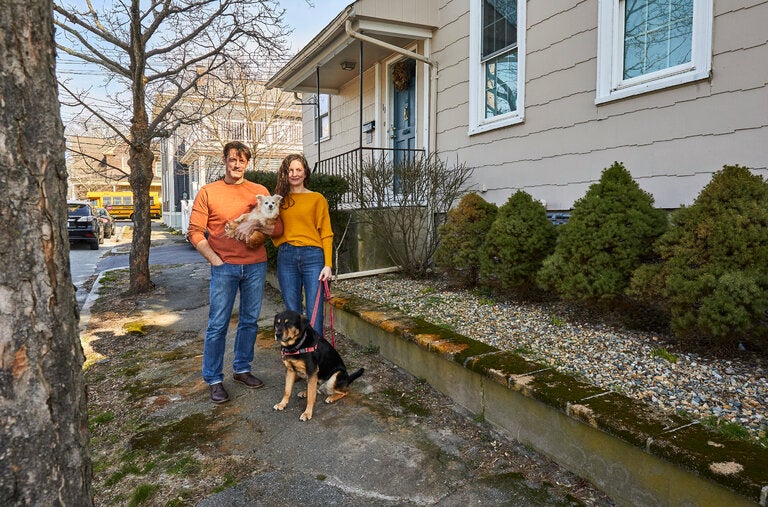 Kathryn Puerini, right, with her fiancé, Nathan Libby, began shopping for their first home in western Rhode Island days after the settlement.