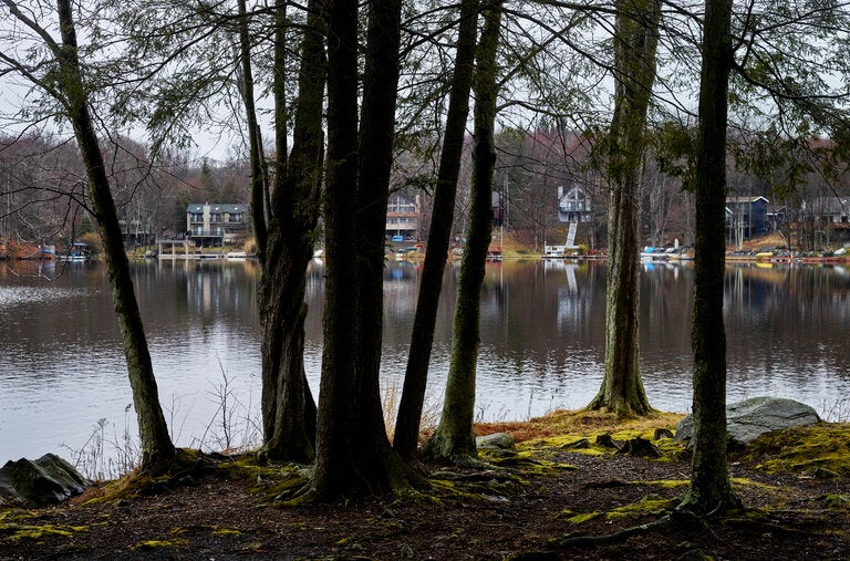 Roamingwood Lake is one of several lakes in the Hideout, a gated community in the Pocono Mountains of Pennsylvania, where the full-timers and short-term rental owners are locked in a battle over the right to rent.