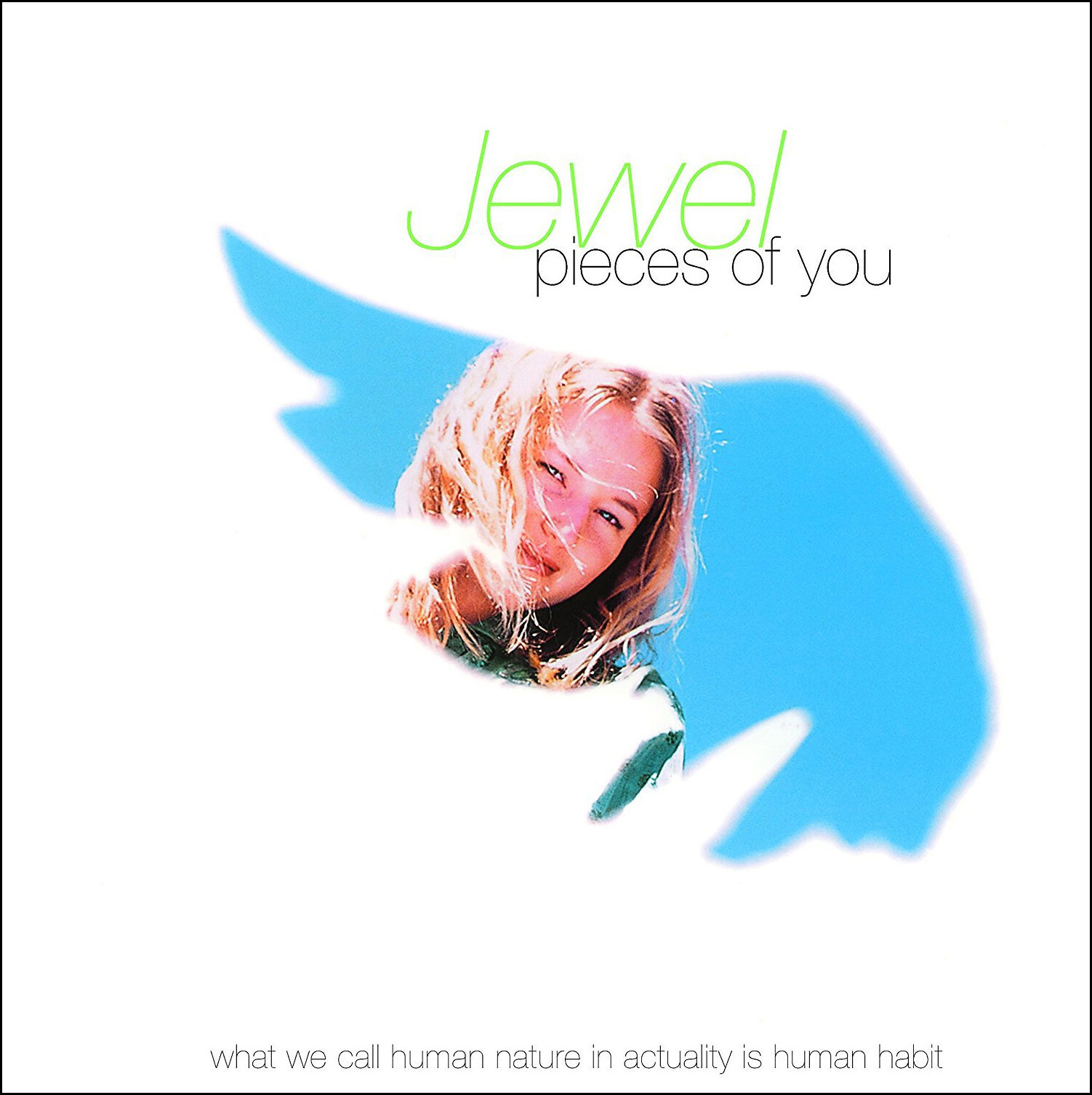 An album cover, with the title "pieces of you" and text reading "what we call human nature in actuality is human habit." The cover image is Jewel, smiling with hair blowing in her face in a wing-shaped cutout.