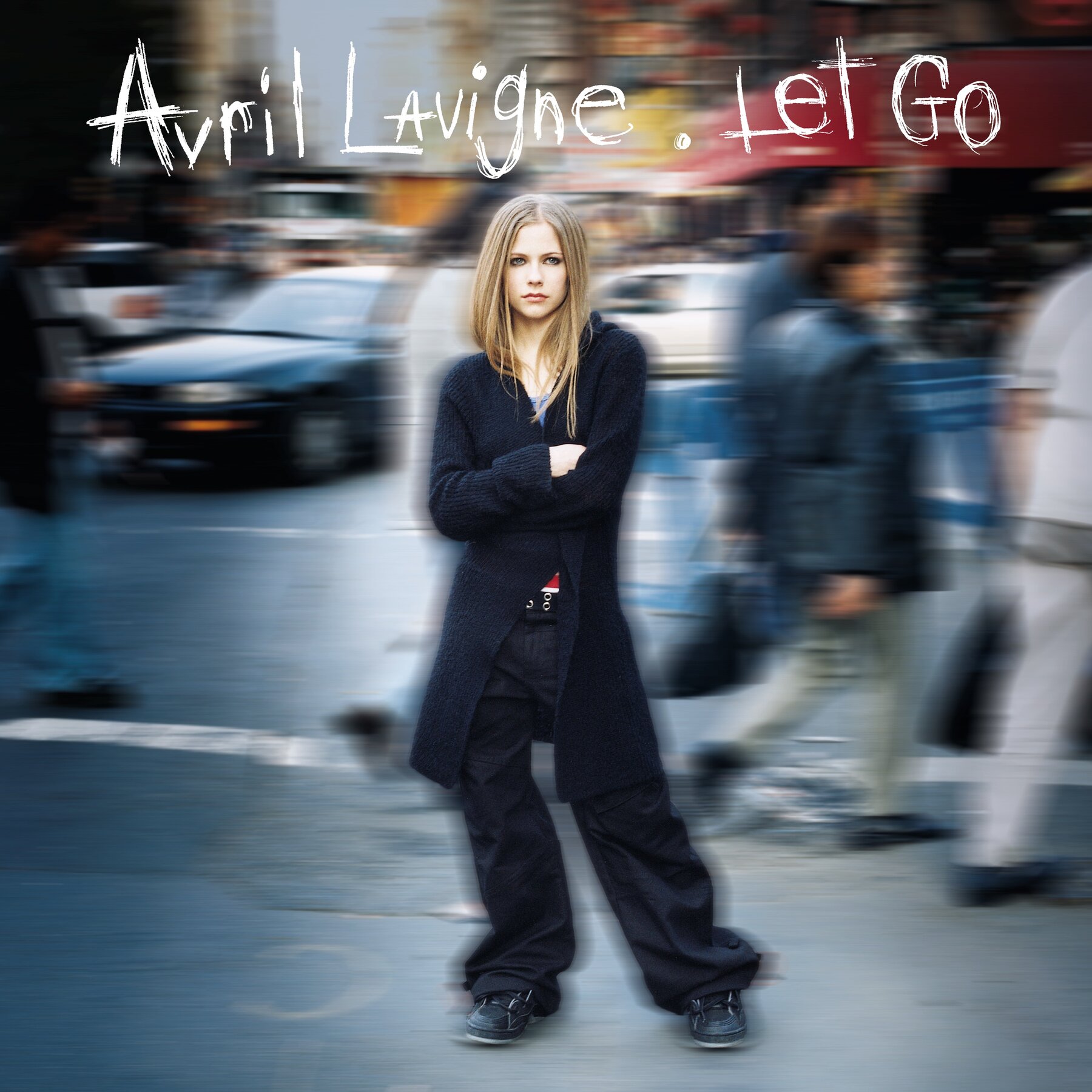 The cover for Avril Lavigne's Let Go album, with the text in a scratched font, and a blurred cover image of Lavigne, wearing all navy, with her arms crossed, standing on the street.