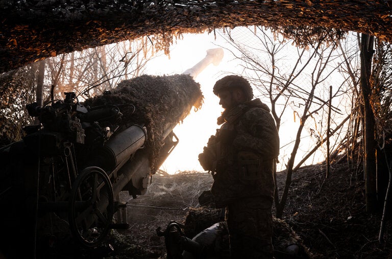 Ukrainian soldiers of the 148th Separate Artillery Brigade with a M777 howitzer at a firing position in the Donetsk region, Ukraine, in March.