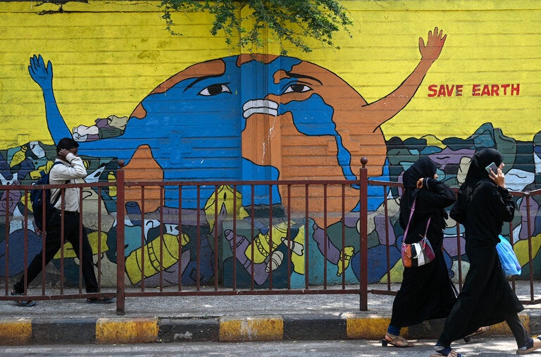 An Earth-themed mural in Mumbai. “One question I get is, ‘Is there any hope?’” said Catrin Einhorn, a reporter who covers biodiversity, wildlife ecosystems and nature.