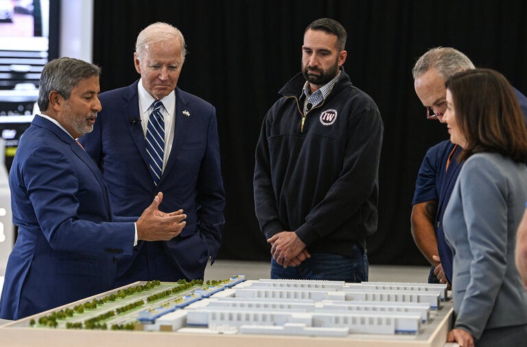 President Biden on a Micron tour in 2022. The funding for Micron stems from the CHIPS Act, which a bipartisan group of lawmakers passed in 2022 to re-establish the United States as a leader in the production of semiconductors.