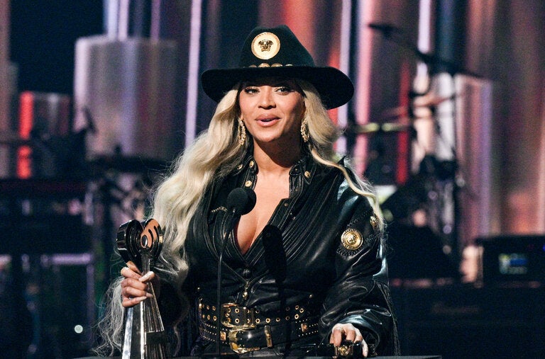 Versace cowgirl: Beyoncé at the iHeartRadio Music Awards in April in a leather jacket with gold Medusa details from the label’s fall 1992 collection.