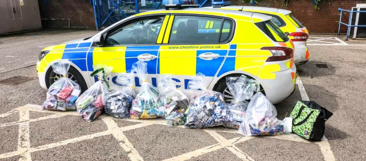 The back-to-back warrants on Market Street, Crewe town centre, started at 9:17am on Sunday 14 May - following reports of the sale of illegal tobacco (Crewe Police).