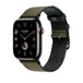 Vert (green) and Noir (black) Toile H Single Tour band, showing Apple Watch face and digital crown.