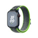 Bright Green and Blue Angled view of Nike Sport Loop, soft, breathable, and lightweight, featuring a hook-and-loop fastener for quick and easy adjustment.