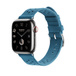 Bleu Jean (blue) Tricot Single Tour band, showing Apple Watch face and digital crown.