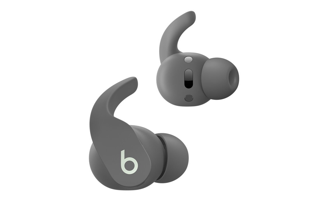 Beats Fit Pro True Wireless Earbuds, in Sage Grey, showing on-ear controls that allow you to manage calls and control music. 