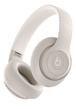 Beats Studio Pro Wireless Headphones in Sandstone, with multi-function on-ear controls.