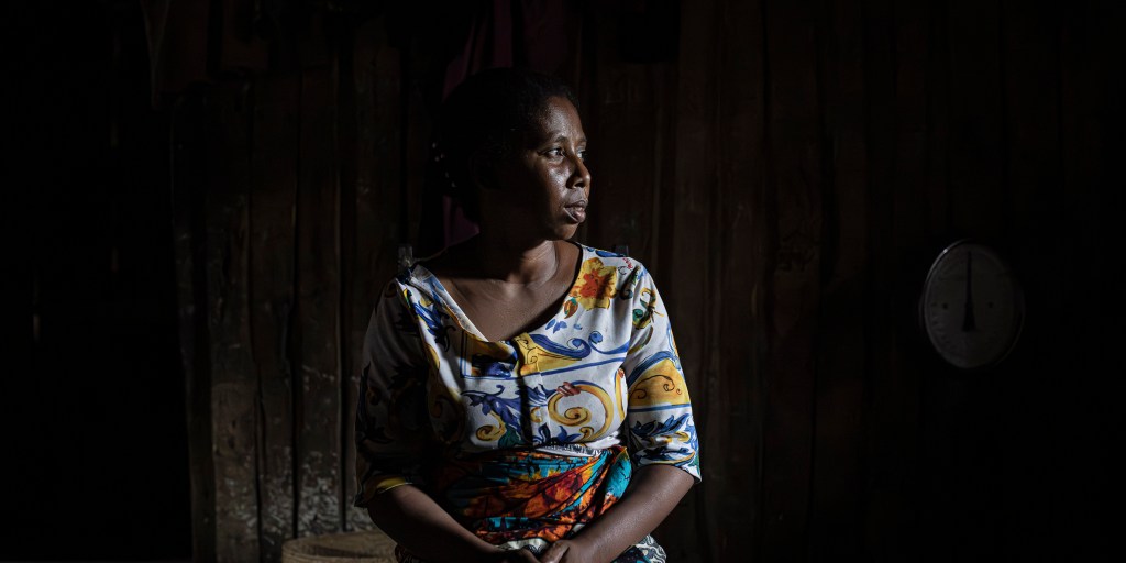 Razafihanta Flogone, 38, poses for a portrait inside her home in Ambinanibe in Fort-Dauphin, Madagascar, on July 11, 2023. Her husband Randriamanjaka Zeze used to fish where the port built by QMM is now located. They had to find new places to fish and she took on weaving to help support her family.