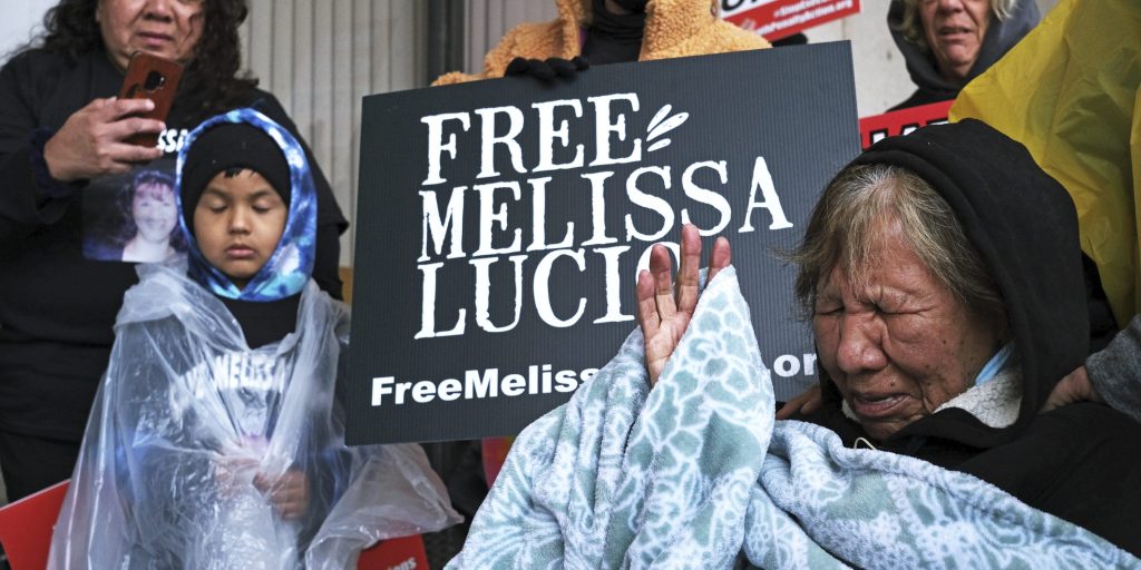 Esperanza Treviño, 77, mother of Melissa Lucio, pleas to the public as she is surrounded by family and friends on the steps of the Cameron County Courthouse Administrative entrance in Brownsville, Texas, on Monday, Feb. 7, 2022, that her daughter is innocent and was wrongfully sentenced to death for the murder of Lucio's 2-year-old daughter, Mariah. A 2008 conviction by a Cameron County, Texas jury found Lucio guilty of capital murder. (Miguel Roberts/The Brownsville Herald via AP)