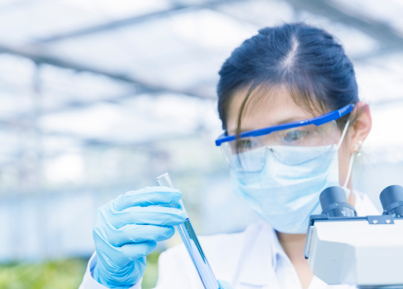 Individual in a lab monitoring vaccines