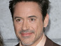 Downey Jr standing by son after arrest