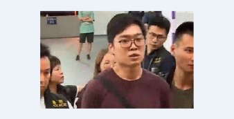 Andy Chan, convenor of the now-banned Hong Kong National Party, is seen in police custody after he was detained on suspicion of possessing offensive weapons. Photo: TVB News/screenshot