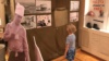 Ребенок рассматривает фотографии, посвященные событиям 1959 года, в темиртауском историко-краеведческом музее. 8 августа 2019 года.