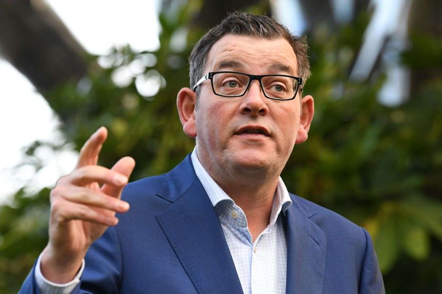 Daniel Andrews addresses a press conference.