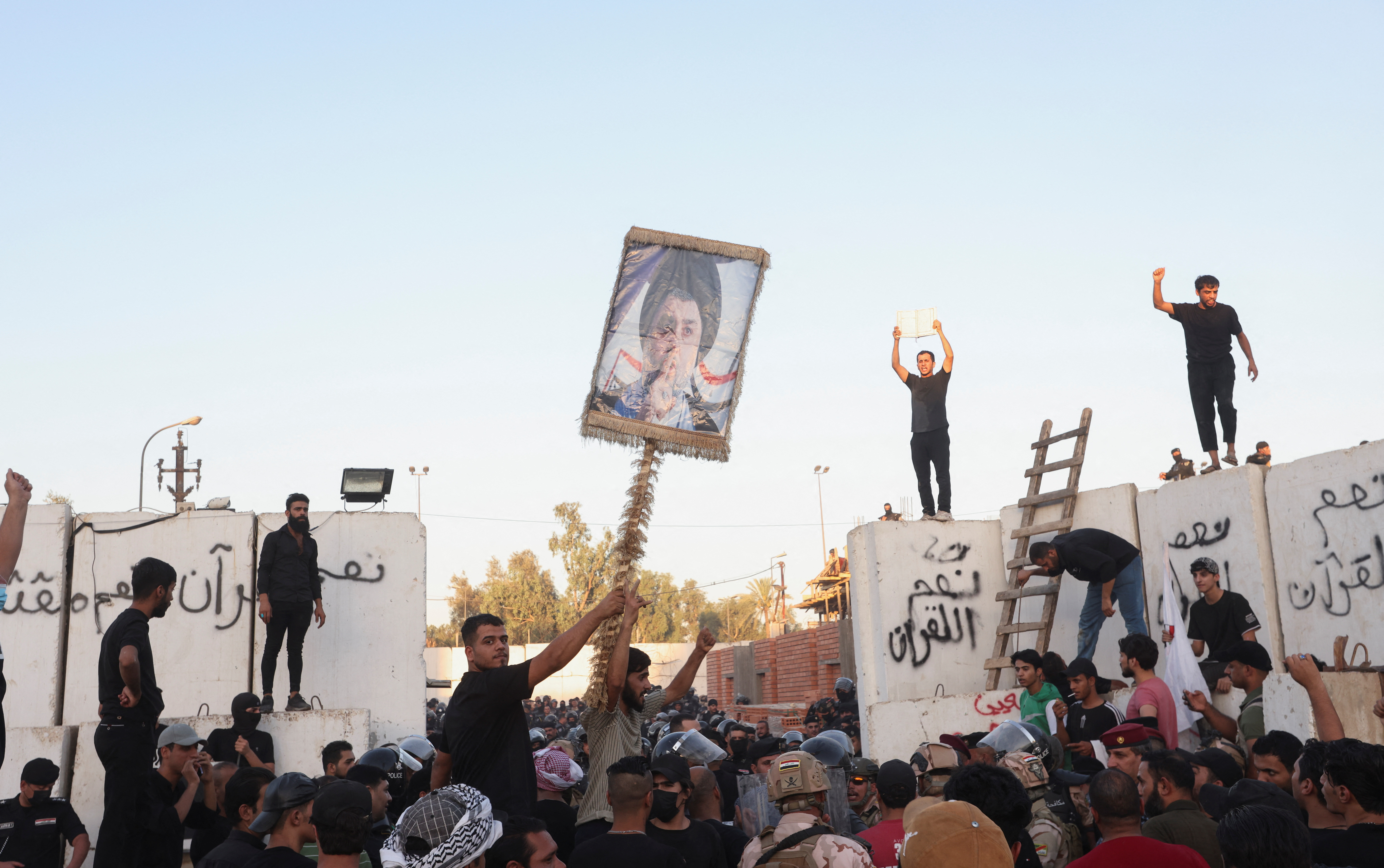 Protesters gather near the Swedish embassy in Baghdad
