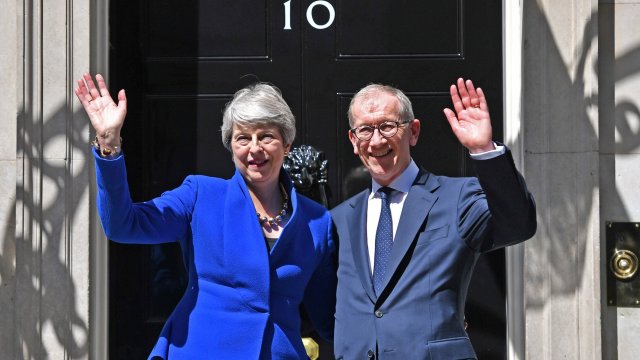 Article thumbnail: File photo dated 24/07/19 of outgoing prime minister Theresa May with her husband Philip outside 10 Downing Street, prior to a meeting at Buckingham Palace where she handed in her resignation to Queen Elizabeth II. Theresa May has said she will not fight the next general election, bringing a 27-year career in Parliament to an end. Issue date: Friday March 8, 2024. PA Photo. See PA story POLITICS May. Photo credit should read: Dominic Lipinski/PA Wire