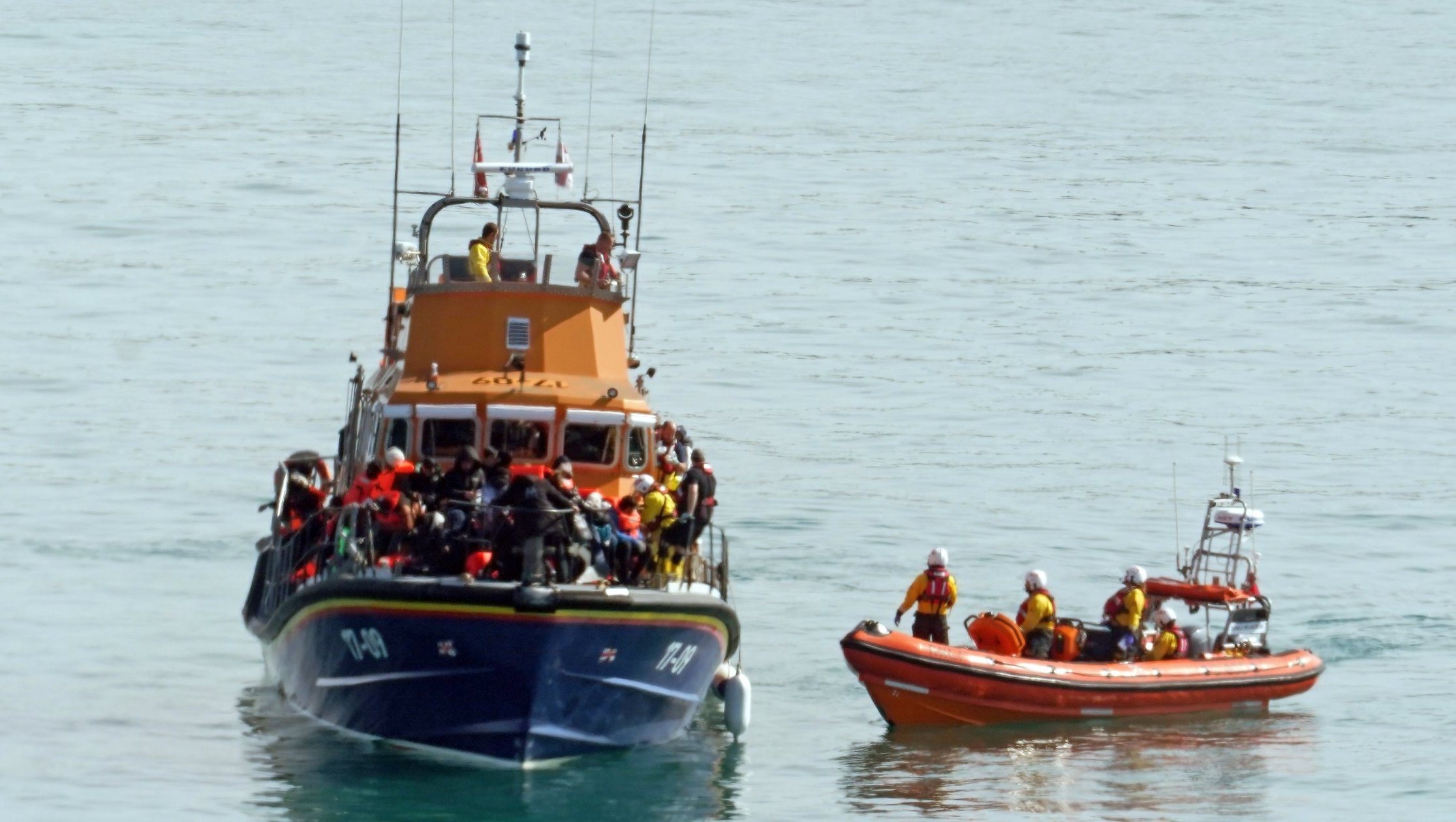 Article thumbnail: A group of people thought to be migrants are brought in to Dover, Kent, onboard the RNLI Dover Lifeboat following a small boat incident in the Channel. Picture date: Wednesday March 20, 2024. PA Photo. See PA story POLITICS Migrants. Photo credit should read: Gareth Fuller/PA Wire The Labour Party will not scrap in full a trio of highly controversial Conservative pieces of legislation on small-boat crossing, but it will act quickly to instead introduce new powers