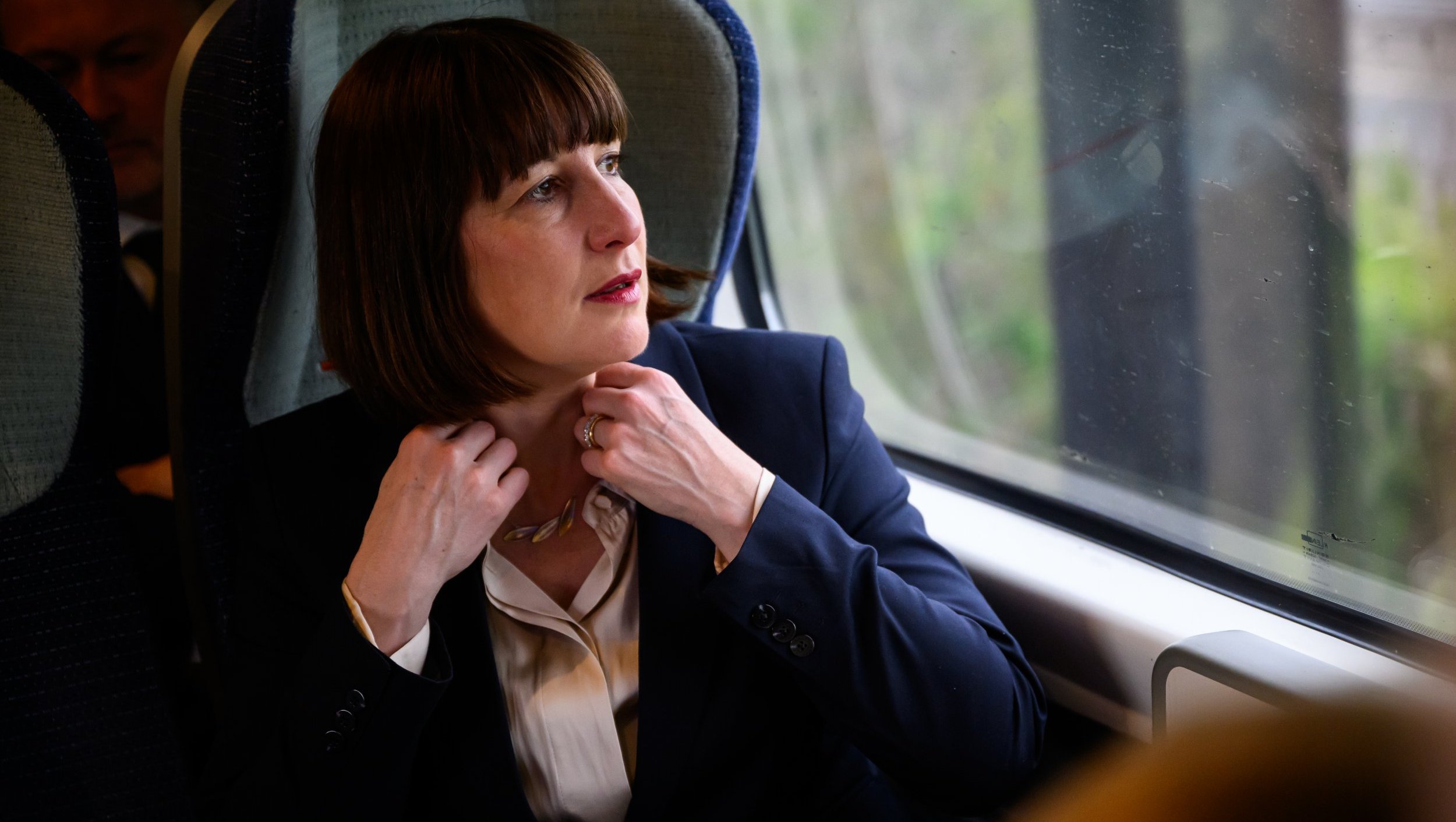 Article thumbnail: THE MIDLANDS, UNITED KINGDOM - APRIL 22: Shadow Chancellor Rachel Reeves travels by train for a Shadow Cabinet meeting on April 22, 2024 in the Midlands, United Kingdom. Labour Party leader Keir Starmer has called for people to "fly the flag" on St George's Day, after writing to all of Labour's general election candidates in a bid to promote the party's use of national identity. (Photo by Leon Neal/Getty Images)