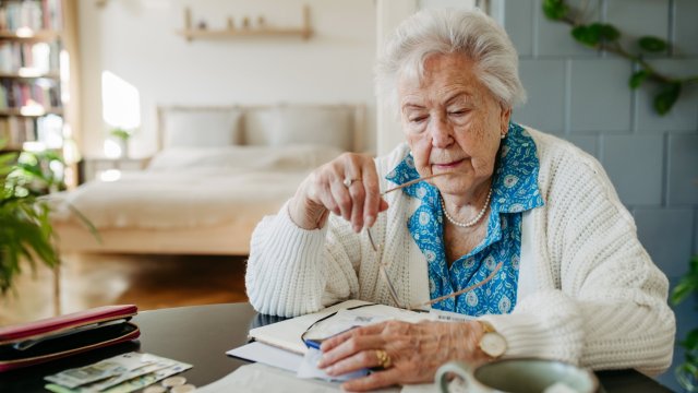 Article thumbnail: Senior woman has financial problems. Counting money, monthly pension, don???t have enough money for paying bills.