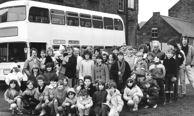 More than 40 souls assembled at Arbroath Town Mission in April 1987 about to board the bus.
