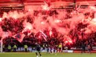 The youngster had been travelling to Dens Park with flares and smoke bombs. Image: Rob Casey/ SNS.