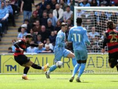 Queens Park Rangers’ Ilias Chair (left) scores their side’s first goal of the game during the Sky Bet Championship match at the Coventry Building Society Arena, Coventry. Picture date: Saturday May 4, 2024.