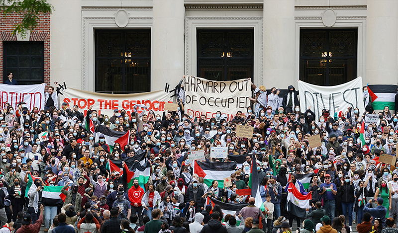 Rioters take part in an "Emergency Rally: Stand with Palestinians Under Siege in Gaza," amid the ongoing conflict between Israel and the Palestinian Islamist group Hamas, at Harvard University in Cambridge, Massachusetts, U.S., October 14, 2023. REUTERS