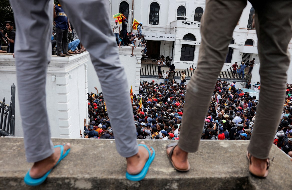 Demonstrators protest inside the President's House premises