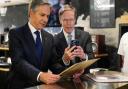 US Secretary of State Antony Blinken and US ambassador to China Nicholas Burns during a visit to Li-Pi record store in Beijing (Mark Schiefelbein/AP)