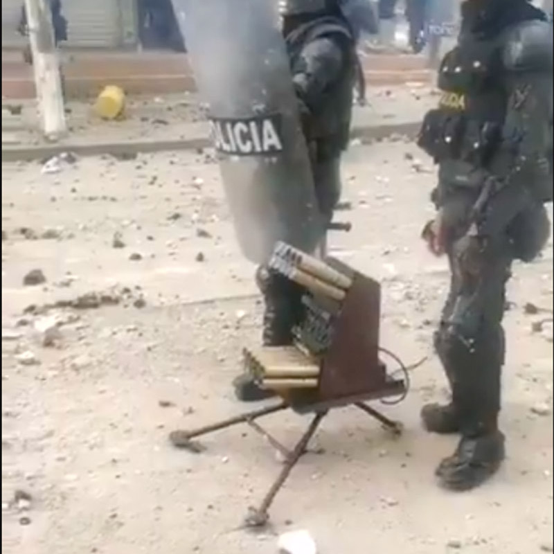 Colombian police using Venom grenade launcher to disperce protesters.