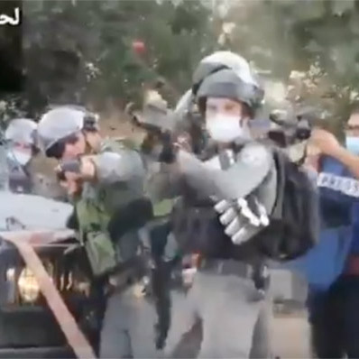 Israeli forces firing at protester.