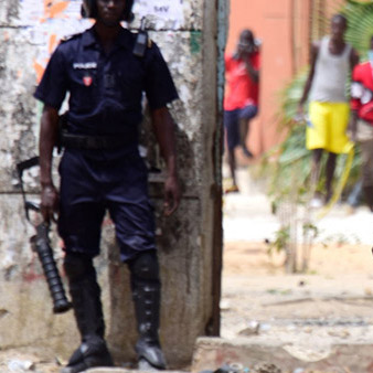 Police forces firing tear gas against protesters in Senegal.
