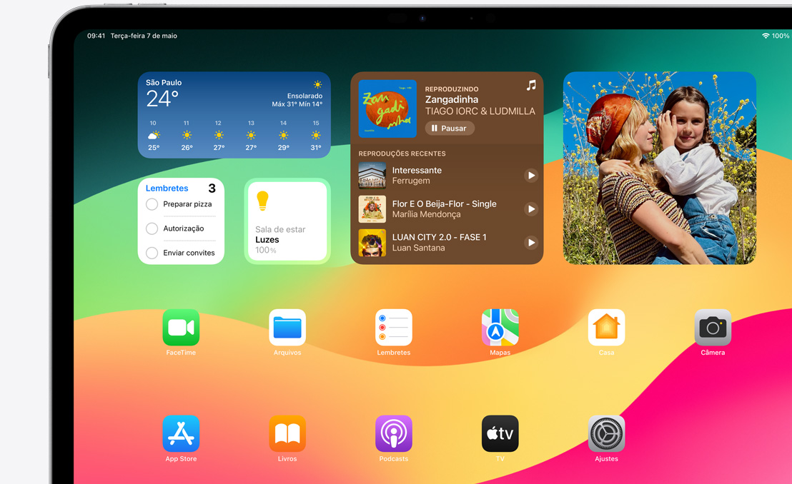 An iPad Pro showcasing Springboard and the different widgets available.