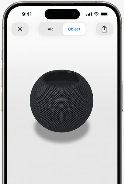 Rymdgrå HomePod på en iPhone-skärm i AR.