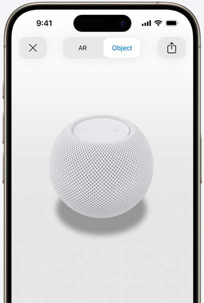 Valkoinen HomePod iPhonen näytöllä lisätyn todellisuuden näkymässä.