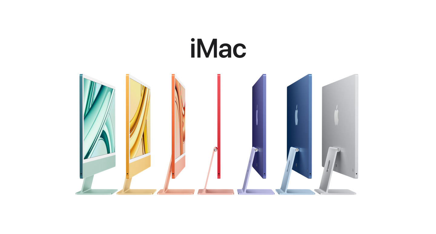 Komputery iMac w kolorze zielonym, żółtym, pomarańczowym, różowym, fioletowym, niebieskim i srebrnym, ustawione bokiem w szeregu, z widocznym logo Apple na tylnej części obudowy