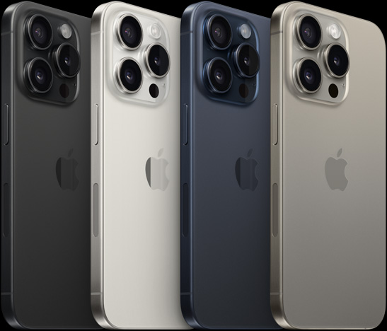 Back view of 6.1″ iPhone 15 Pro in four different colors — Black Titanium, White Titanium, Blue Titanium, and Natural Titanium