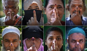 Hectoliters of purple ink mark voters in India’s colossal poll