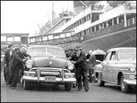 Cars being pushed on to ships