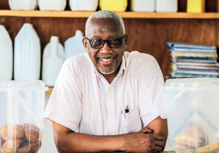 Yusuf Gatikabisi owns Kuruhimbi milk bar in Rwanda