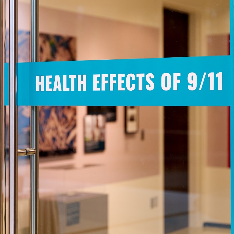 Health Effects of 9/11 banner on a door